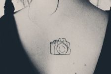 Cool camera tattoo on the back