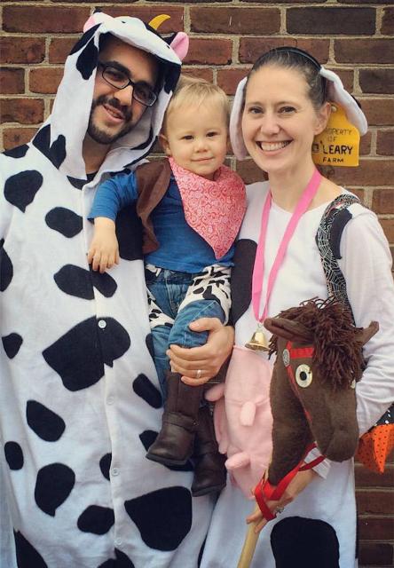 cow costumes for the parents, and a cowboy costume for the son