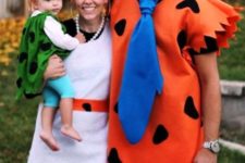 Fred And Wilma Flintstone costumes for the parents, Bamm Bamm Rubble costume for the kid