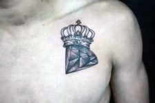 Crown and diamond tattoo on the chest