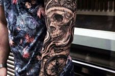 Crown and skull tattoo on the arm