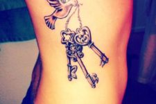 Dove and three keys tattoo on the side
