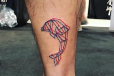 Geometric dolphin tattoo on the leg