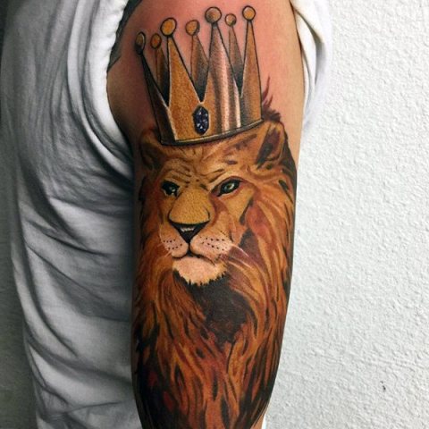Gorgeous lion and crown tattoo