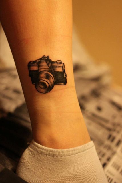 Interesting 3D camera tattoo on the ankle