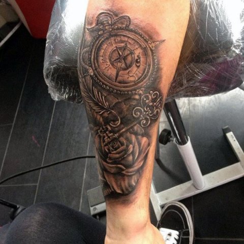 Key, rose and compass tattoo