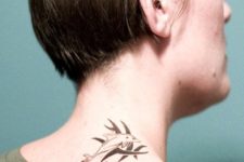 dolphin neck tattoo