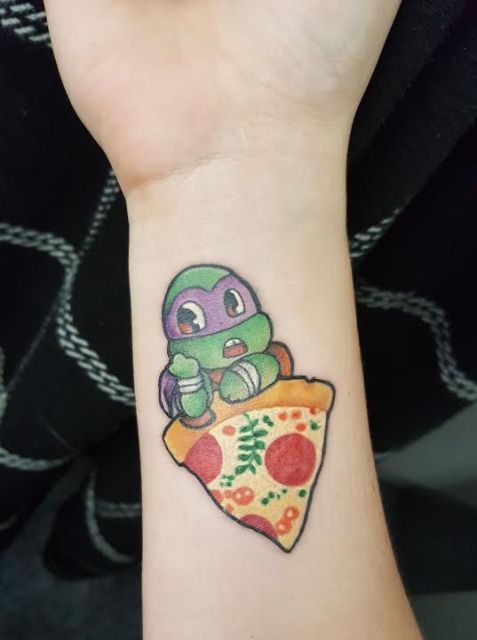 Ninja turtle tattoo on the forearm