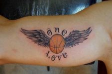 One love tattoo on the biceps
