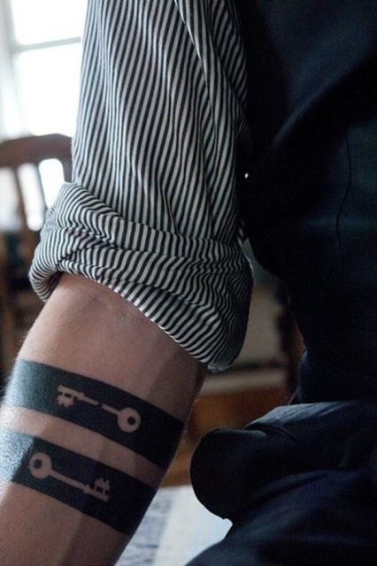 Original key tattoos on the arm
