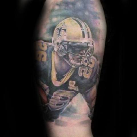 Realistic football player tattoo on the hand