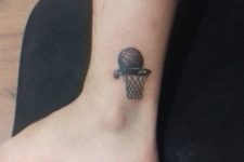 Small basket and ball tattoo on the ankle