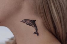 Small dolphin tattoo idea on the neck