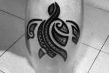 Small tribal turtle tattoo on the leg
