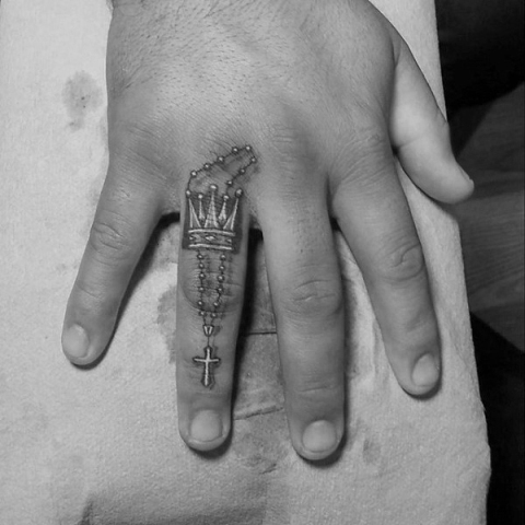 Tiny tattoo on the finger
