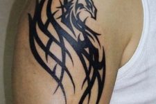 Tribal tattoo on the biceps