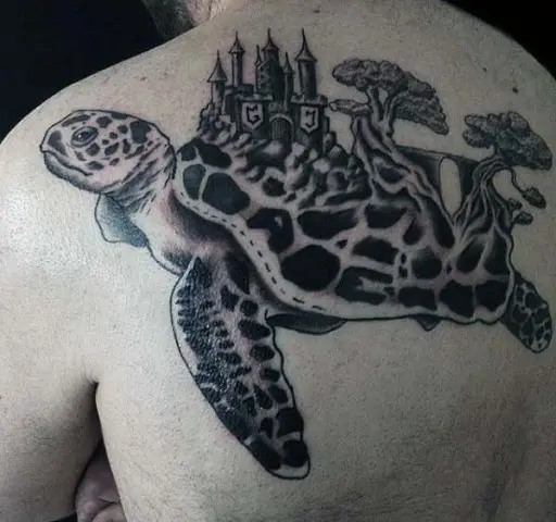 Turtle with castle tattoo on the back