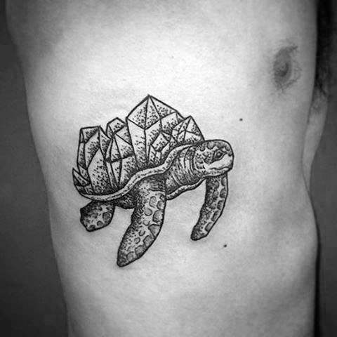 Turtle with gem stones on shell tattoo on the side
