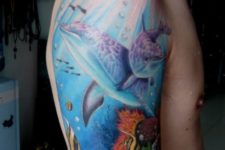 Two dolphins under the sea tattoo