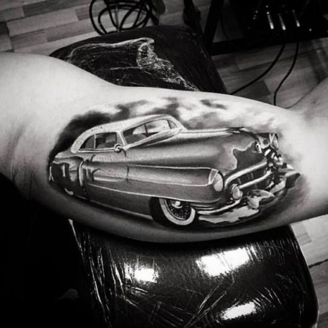 Vintage car tattoo on the arm