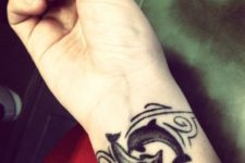 yin yang wrist tattoo