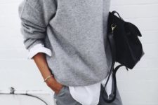 02 grey pants, a white shirt, a grey sweater and a black bag for any work
