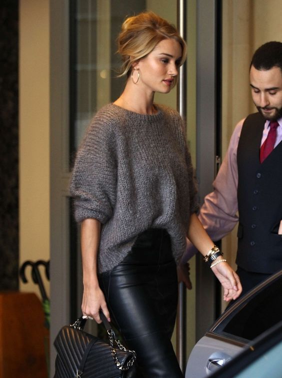 a black leather midi skirt, a grey oversized sweater and a large bag for a sexy winter look