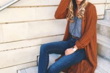 a comfy long burnt orange cardigan, a grey top, blue cuffed jeans and burnt orange shoes