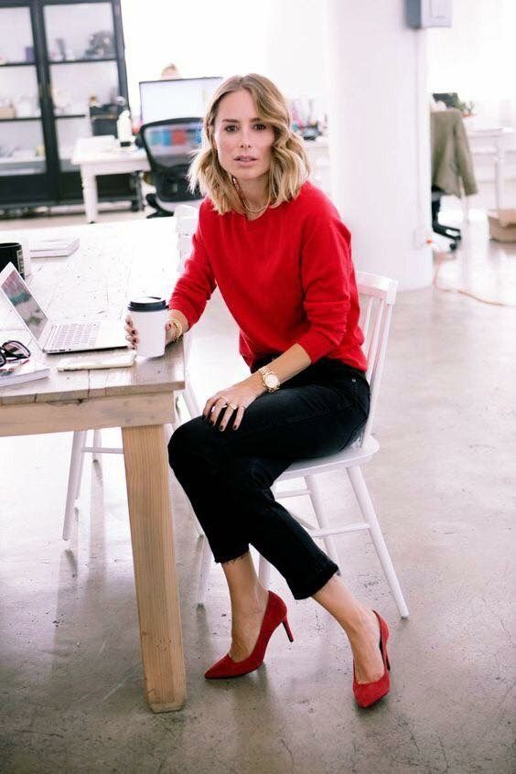 a red sweater and shoes plus black denim for a creative job outfit