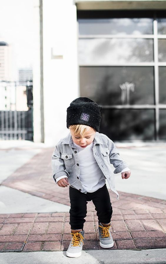 black pants, a white tee, a bleached denim jacket, grey sneakers, a black beanie to feel warm and cozy