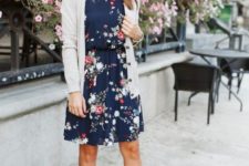 06 a navy over the knee floral dress, a creamy cardigan and creamy suede booties