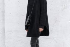 09 a black oversized sweater, black leather leggings, black booties and a black bag