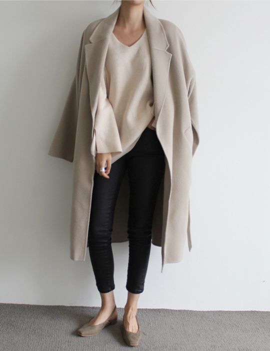 black cropped jeans, a creamy sweater, a blush coat and grey suede flats for comfort