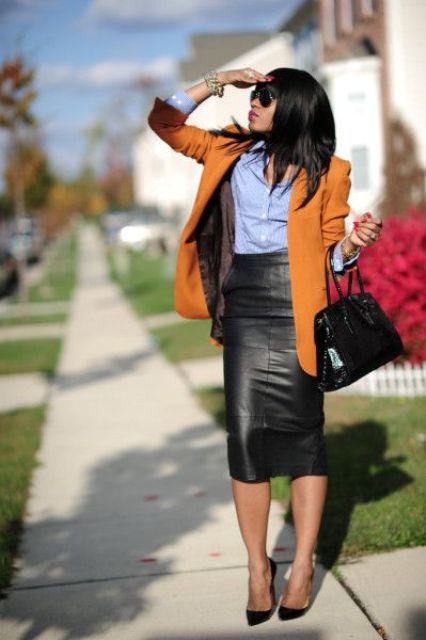 a black pencil skirt, a blue shirt, a mustard jacket and black shoes for work