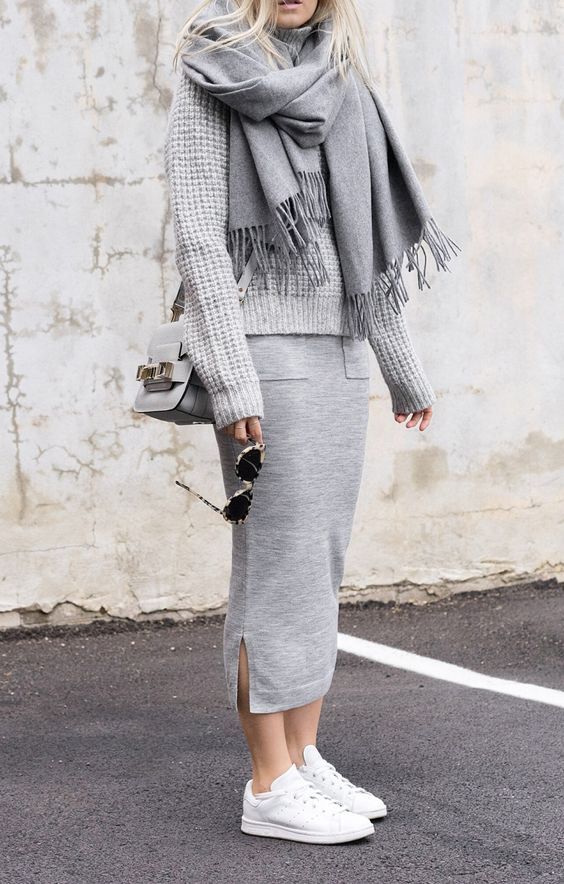 a grey midi skirt, a grey sweater, a grey scarf, white sneakers and a grey bag for a comfy look