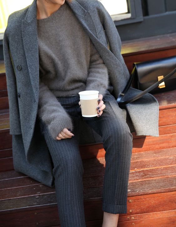 striped grey pants, a grey angora sweater and a grey wood coat are an ideal example of fall layering