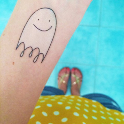 Adorable little ghost tattoo on the forearm