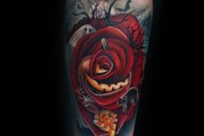 Red rose and white ghost tattoo