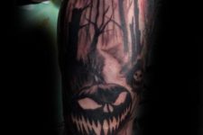Scary forest and pumpkin tattoo