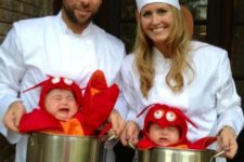 Two little boys as lobster and mom and dad as chefs