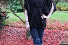 With black loose shirt and jeans