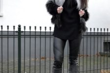 With black turtleneck, leather pants and gray high boots