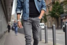 With denim jacket, gray skinny pants and white and black sneakers
