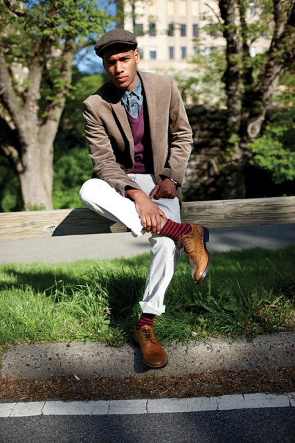 With denim shirt, purple vest, light brown jacket, white pants and brown shoes