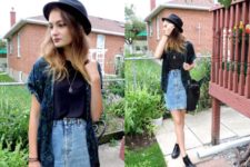 With flat ankle boots, hat and printed shirt