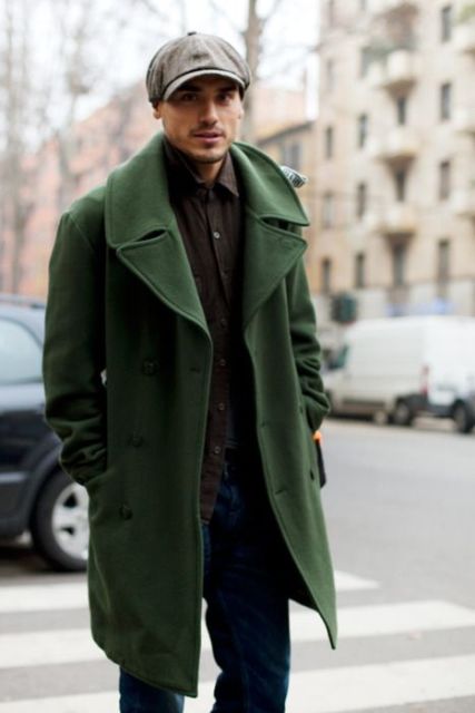 With green coat, brown shirt and jeans