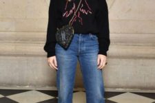 With printed sweatshirt, flare jeans, black pumps and crossbody bag
