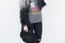 With printed t-shirt, jeans, platform boots and hat