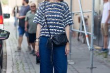 With striped shirt, white sneakers and crossbody bag