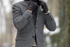 With tweed jacket, striped shirt, black gloves and black pants